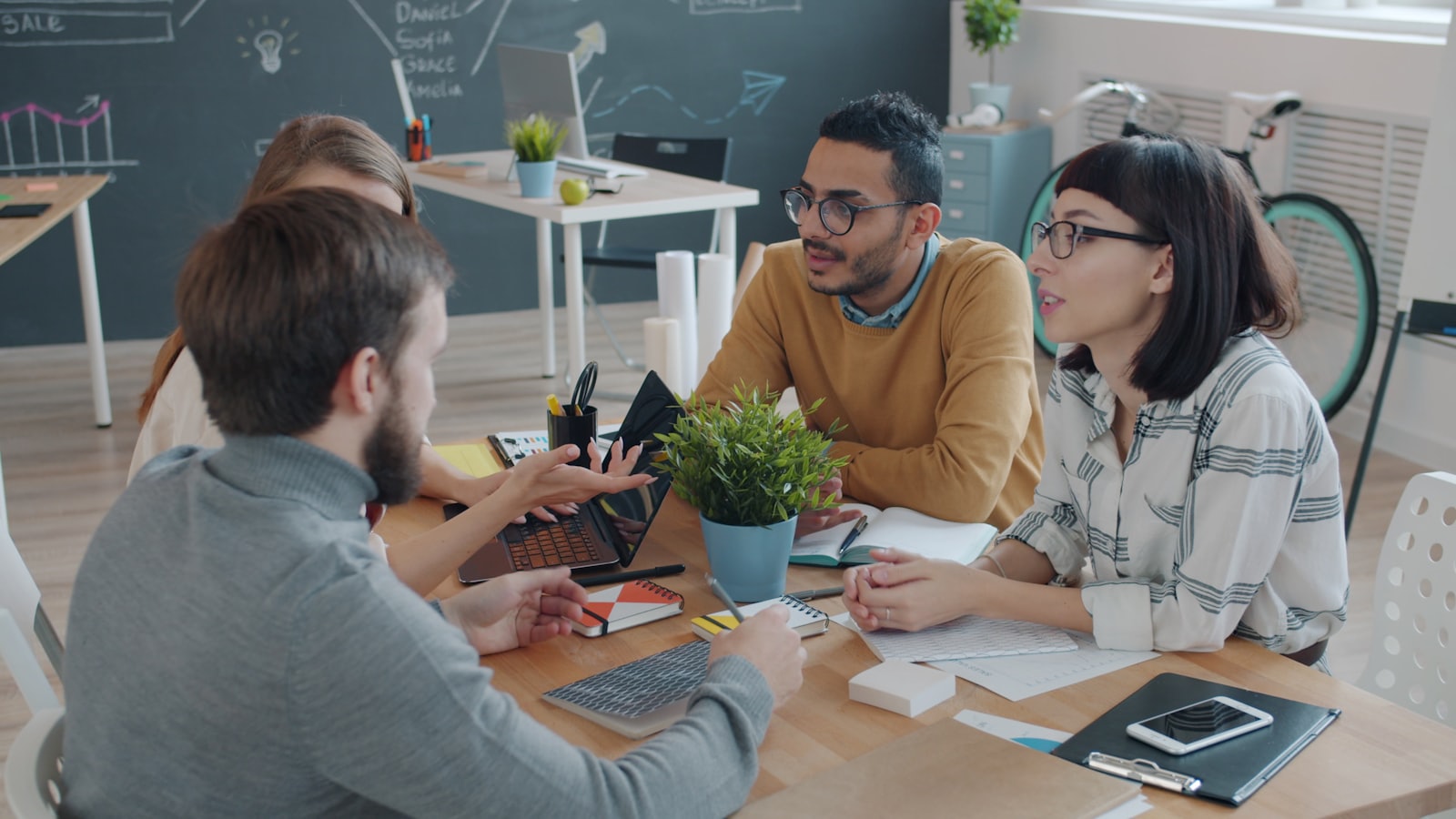 A team collaborating around a table in an office